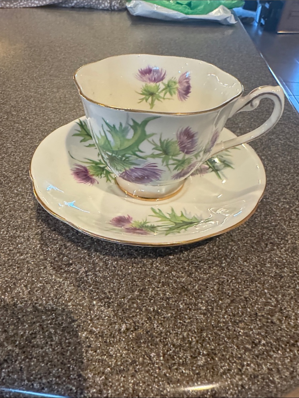 Porcelain Teacup and Saucer with Purple Thistle Pattern